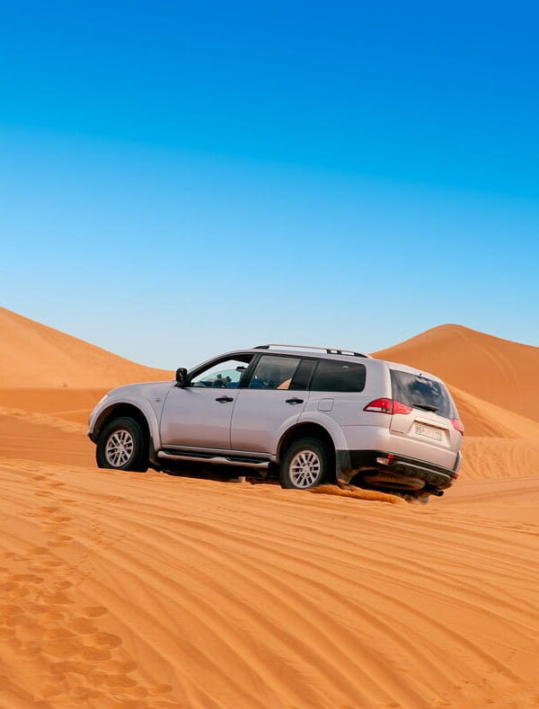 4x4 desert tour in Morocco crossing the Sahara dunes during an off-road adventure