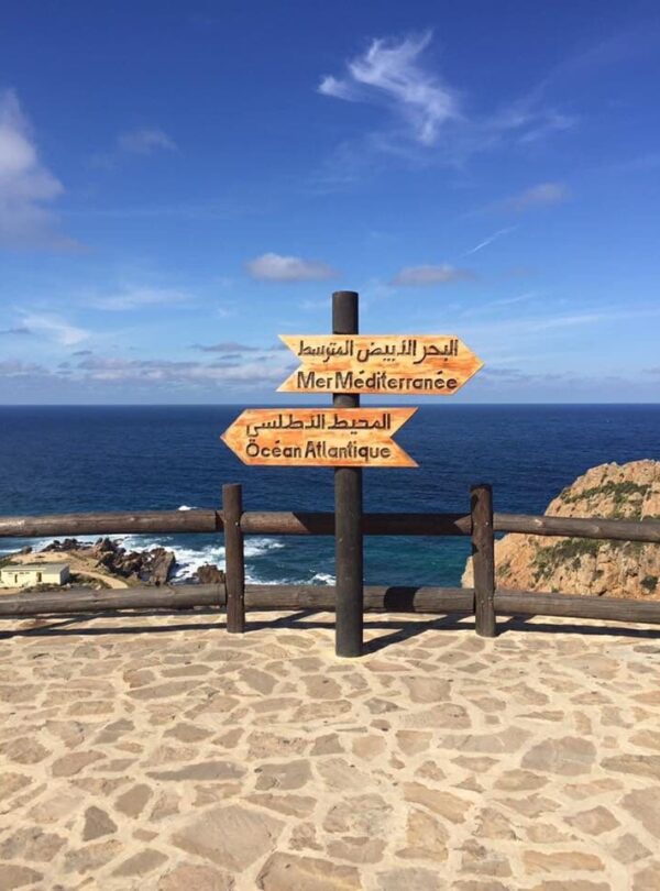 Sign marking the meeting point of the Mediterranean Sea and Atlantic Ocean at Cap Spartel near Tangier.