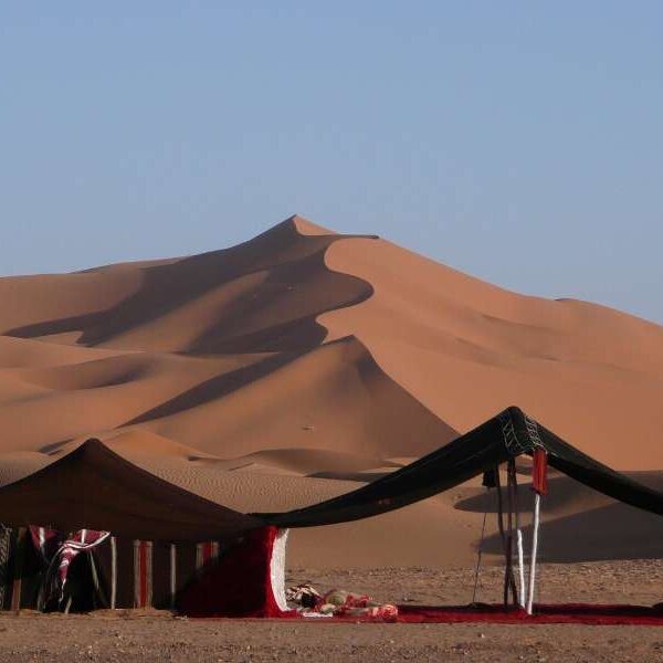 Traditional Berber desert tent camp near Erg Chebbi dunes in Merzouga Sahara Morocco