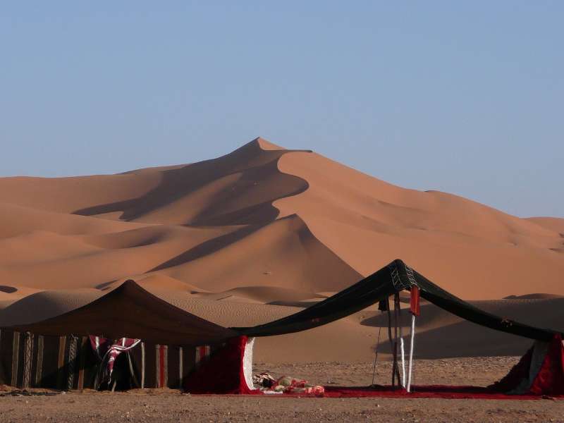 Traditional Berber desert tent camp near Erg Chebbi dunes in Merzouga Sahara Morocco